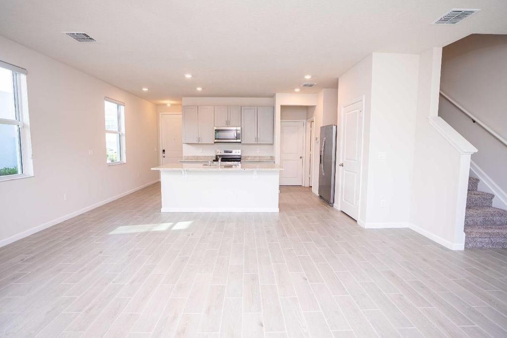 Photo of 197 Osprey Preserve Boulevard, Jensen Beach, FL 34957 (MLS # R11122896)