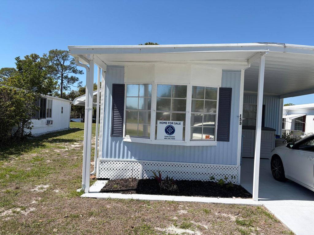 Photo of 153 Camino Del Rio, Port Saint Lucie, FL 34952 (MLS # B26006141)