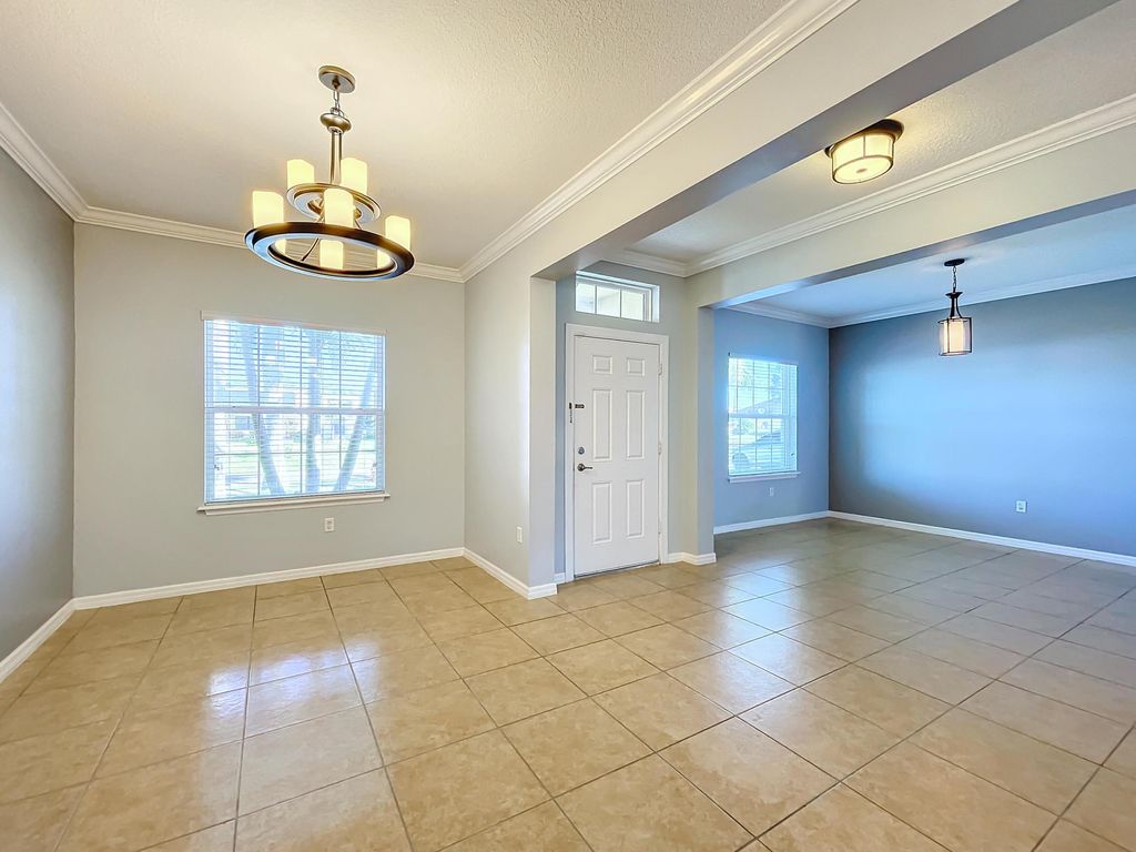 Photo of 520 SW Dailey Avenue, Port Saint Lucie, FL 34953 (MLS # R10954440)