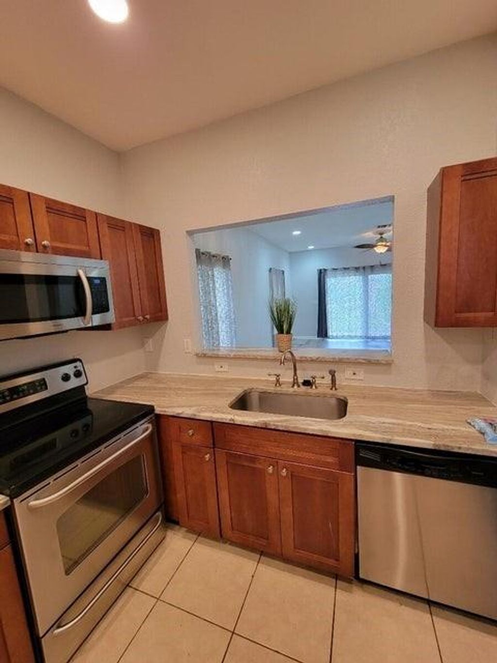 Photo of 197 NW Eller St, Deerfield Beach, FL 33441 (MLS # F10542324)