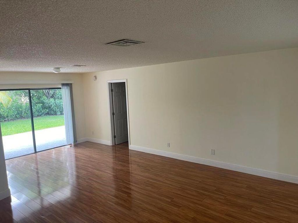 Photo of 111 Champions Run, Riviera Beach, FL 33407 (MLS # R11113297)