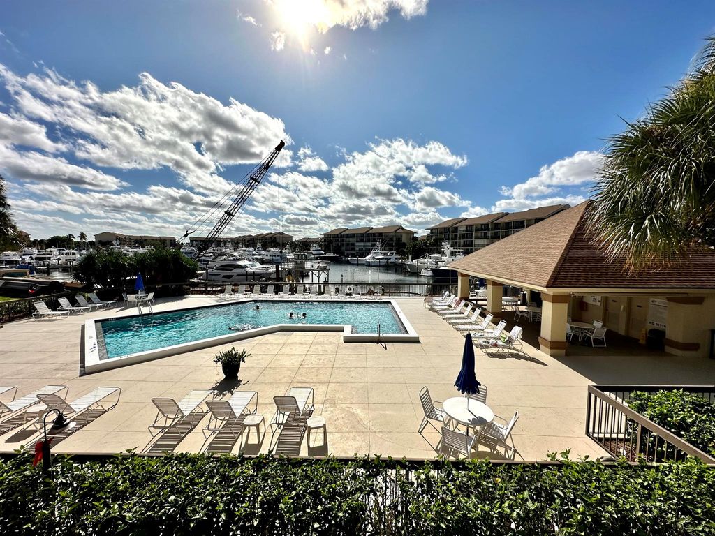 Photo of 1501 Marina Isle Way #205, Jupiter, FL 33477 (MLS # R11136177)