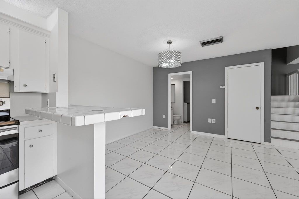 Photo of 3310 Meridian Way S #A, Palm Beach Gardens, FL 33410 (MLS # R11147168)