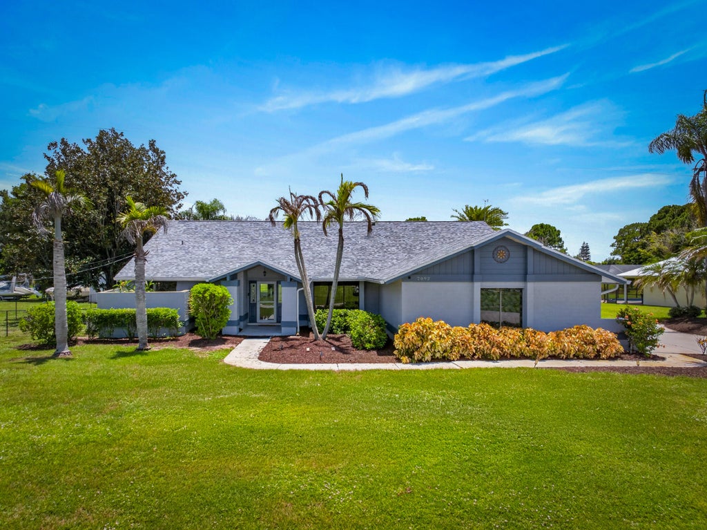 Photo of 2092 SE PYRAMID Road, Port Saint Lucie, FL 34952 (MLS # B26054191)