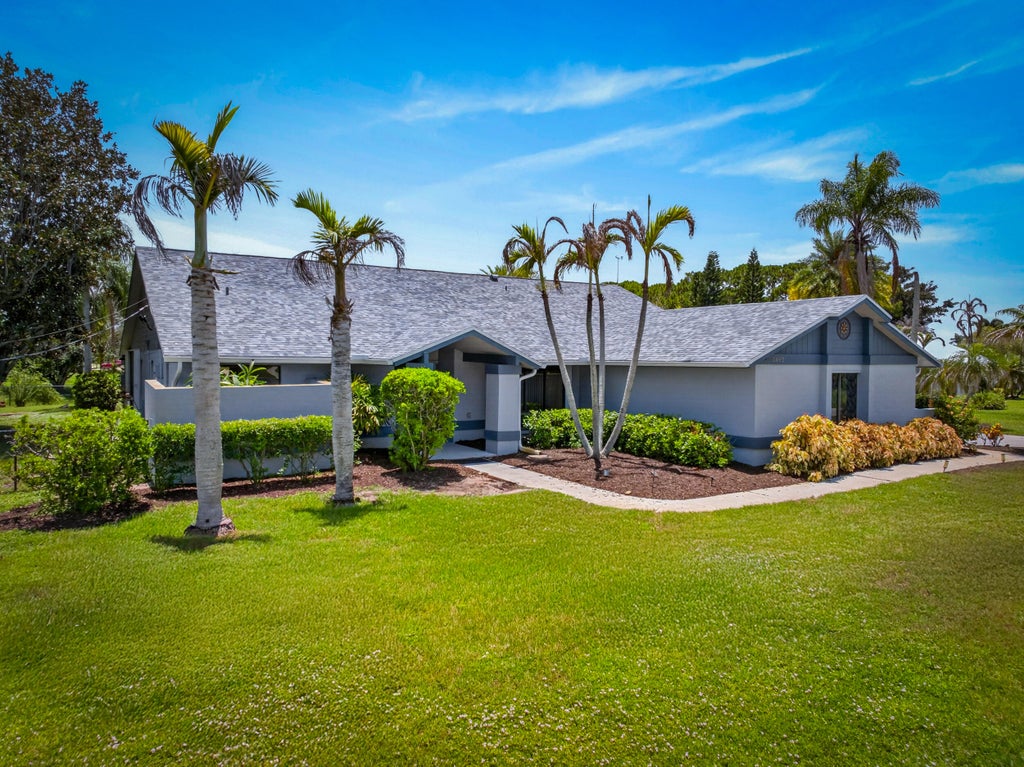 Photo of 2092 SE PYRAMID Road, Port Saint Lucie, FL 34952 (MLS # B26054191)