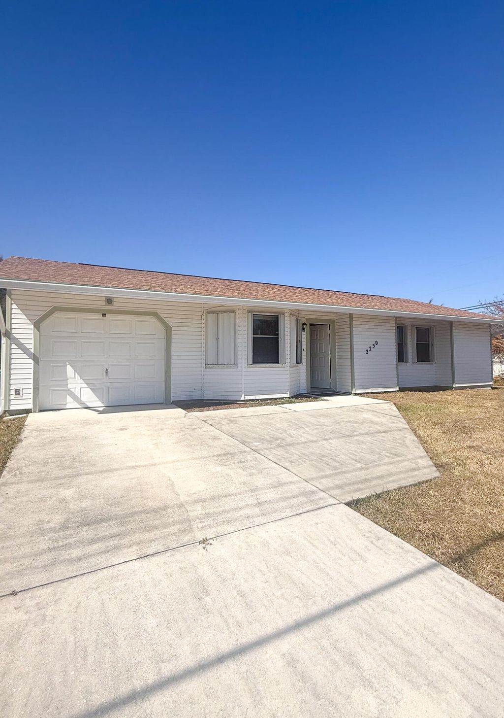 Photo of 2250 SW Pamona Street, Port Saint Lucie, FL 34953 (MLS # R11164700)