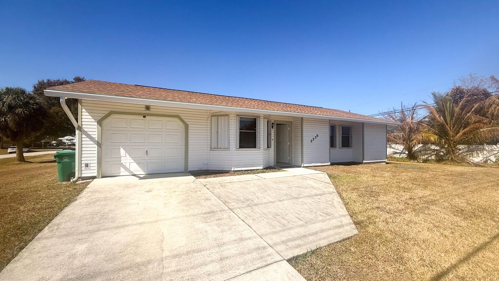 Photo of 2250 SW Pamona Street, Port Saint Lucie, FL 34953 (MLS # R11164700)