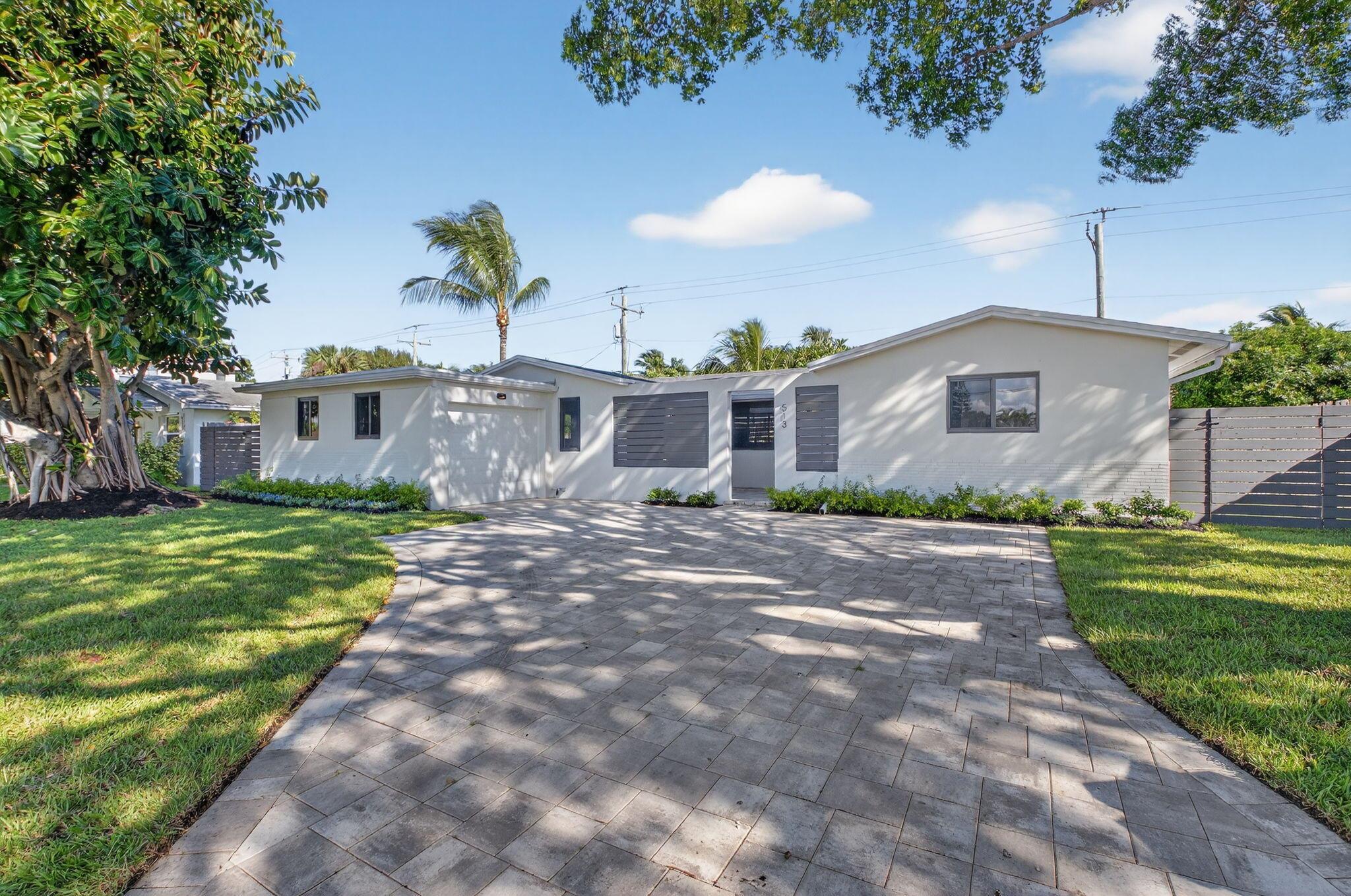 This is the ultimate South Florida rental, available unfurnished annually or as a turnkey seasonal rental.Stunning 2 bedroom single-family home, completely updated and featuring an all-new interior and luxurious finishes throughout. Enjoy peace of mind with a new roof and new hurricane impact windows. Gorgeous kitchen with brand new appliances, ample storage, quartz countertops. New Washer & dryer. Spacious screened in patio. Large fully fenced yard is perfect for entertaining, complete with brand-new tropical landscaping that adds a lush, private retreat. Located just minutes from top shopping, dining, and downtown Delray Beach, plus a quick drive to the ocean, this home offers the best of South Florida living- now available for rent!