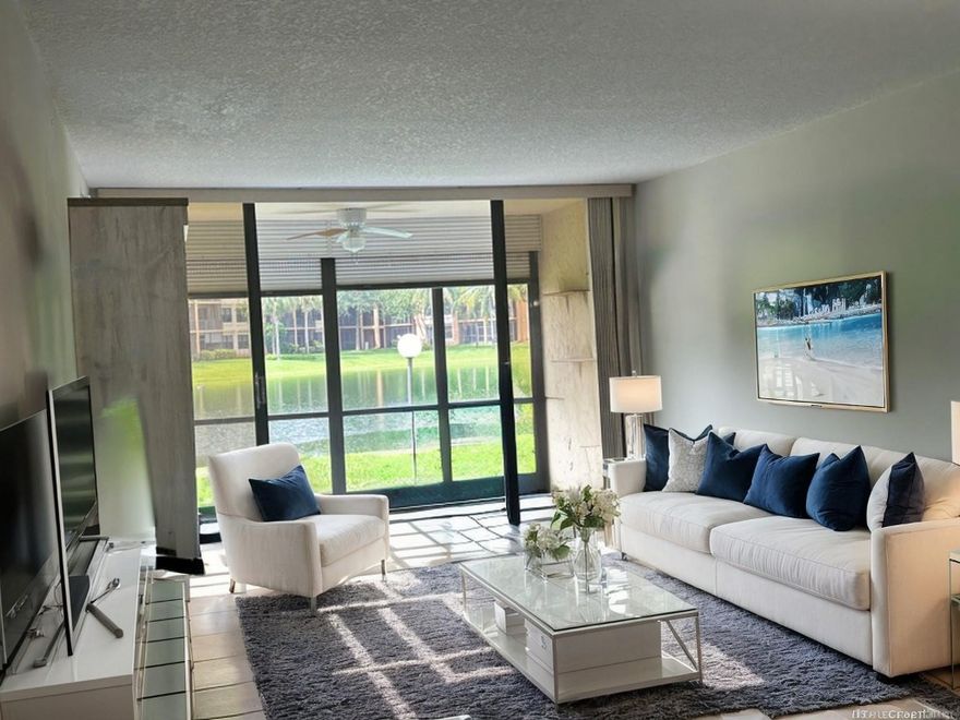 Discover this delightful first-floor unit in the sought-after Coral Gate community of Margate. Enjoy a view of the serene lake, all while being conveniently close to shopping, dining, and entertainment.This unit features a split floor plan, ensuring privacy and space. The kitchen has been tastefully updated and offers plenty of cabinetry, perfect for the home chef. The guest bathroom has also been newly remodeled, and the guest bedroom is the only room with carpet, with the rest of the unit is  easy-to-maintain tile flooring.The spacious master suite comes with three closets, offering ample storage space. The unit is equipped with a washer and dryer for your convenience. Bldg has storage room. Pool and tennis courts just a short walk away. Building has passed 40y inspections.