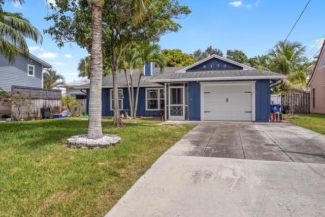 This no HOA home boasts hurricane- impact windows and sliding doors, stainless steel appliances and elegant tile flooring throughout then house. Enjoy the comfort of screened in porch and patio. High ceilings with built in cabinets in the kitchen and a skylight that brings natural light to the breakfast room. Step outside to a Tropical Oasis with this beautifully landscaped backyard with new turf surrounding a cozy fire pit. Inside the living room features an electric fireplace perfect for relaxing evenings.
