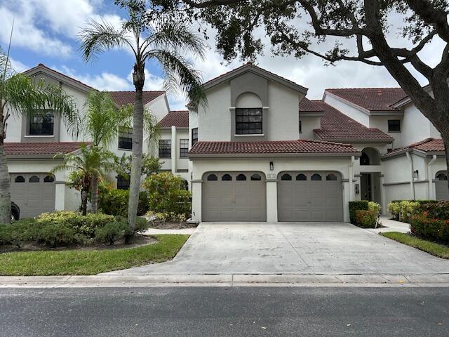 ALL AGES ,GROUND FLOOR ,STEPS TO CLUBHOUSE , Onsite Cafe. Fantastic location close to 95 ,Turnpike.Shopping ,schools.Spacious bedrooms and plenty of Storage. Updated Kitchen and newer appliances. A wonderful Ground floor unit with your own Garage, laundry room AC-2018,WH 2014.Roof 2013 (Condo responsibility).Walking Distance to Clubhouse and Pools.Sit on the patio with a peaceful and relaxing view. All you pay is electric. Condo Fee covers ,Cable, Direct TV.Gym,Tennis,Pickleball and VERY large Pool.Water, trash , maintenance, all maintained by association,security,bldg insurance. There is a camera in unit.