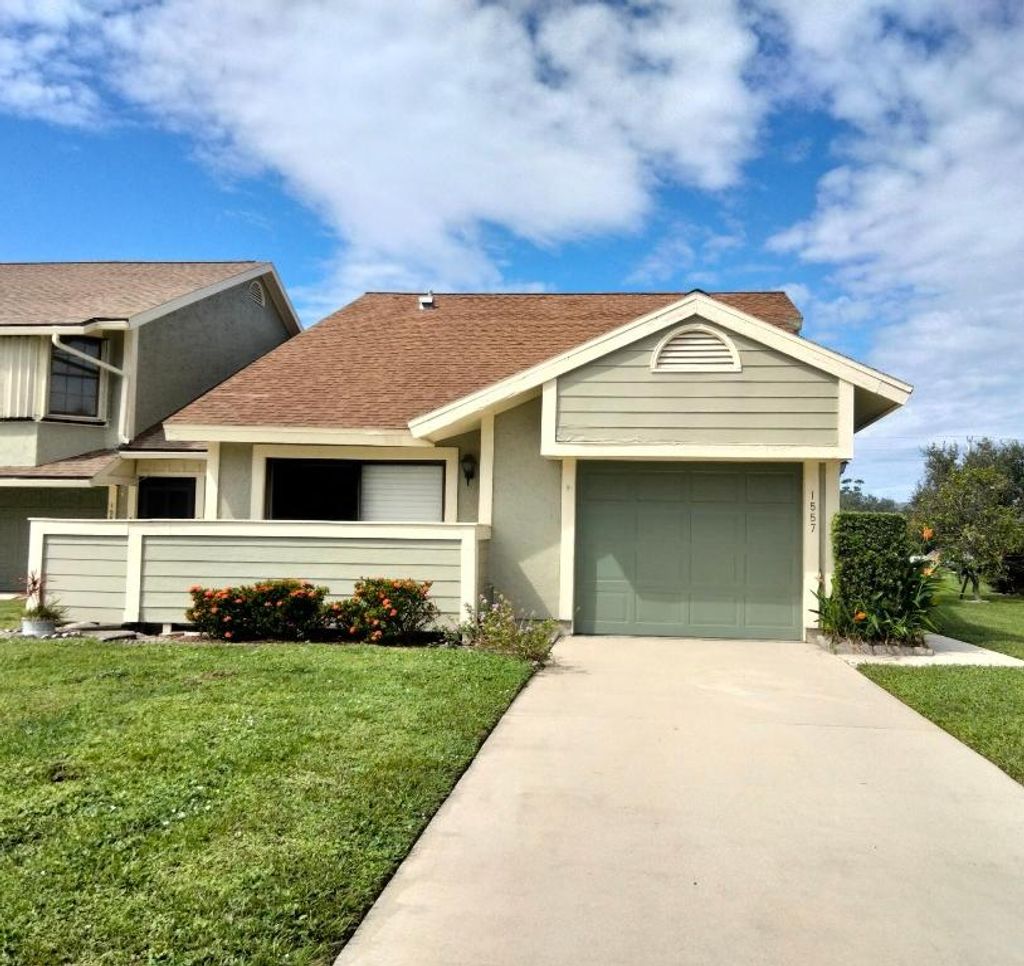 Photo of 1557 SE Crayrich Court, Port Saint Lucie, FL 34952 (MLS # R10952144)