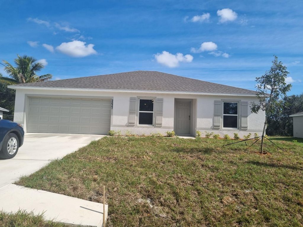 Photo of 2627 SW Harem Circle, Port Saint Lucie, FL 34953 (MLS # R10933866)