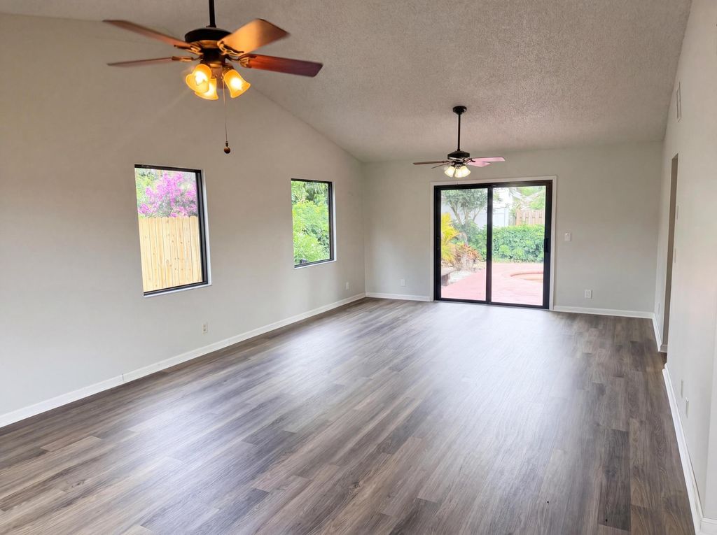 Photo of 118 Waterway RD, Royal Palm Beach, FL 33411 (MLS # B26029203)