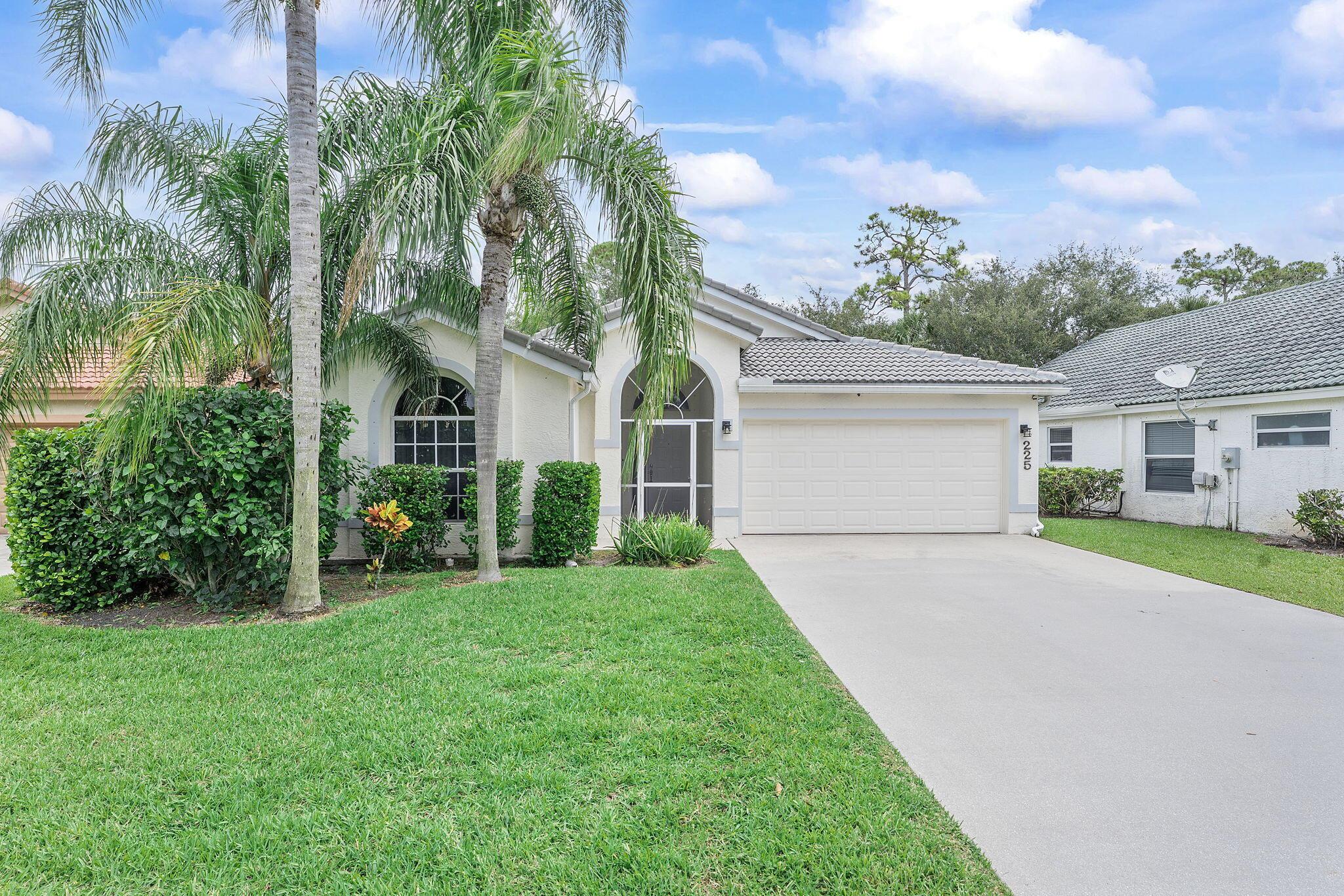 Welcome to this well-maintained 3-bedroom, 2-bath home in desirable Royal Palm Beach. Featuring a classic Florida-style exterior with barrel tile roof, this property offers an appealing blend of comfort and style in an established neighborhood.Inside, you'll discover an open concept layout with vaulted ceilings and neutral tones throughout. The bright, airy living spaces flow seamlessly throughout the comfortable family room.