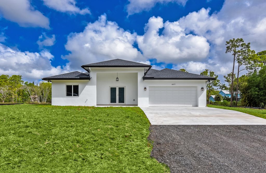 Photo of 13177 47th Court N, The Acreage, FL 33411 (MLS # B26011663)