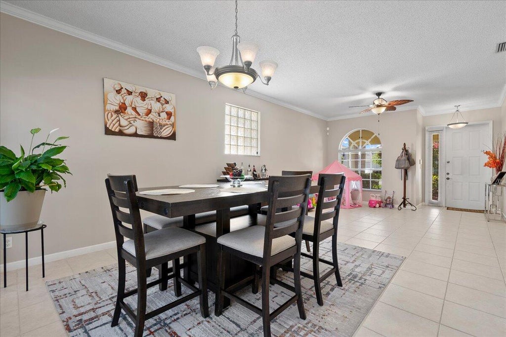 Photo of 114 Lancaster Way, Royal Palm Beach, FL 33414 (MLS # B26039820)