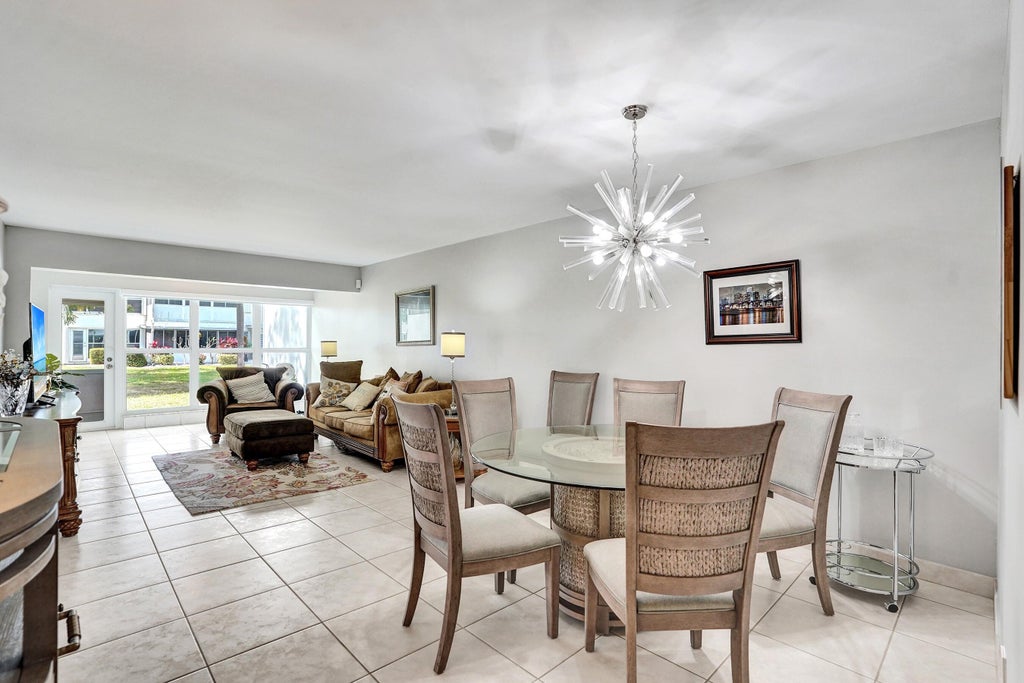 Photo of 1435 SW 27th Avenue #101, Delray Beach, FL 33445 (MLS # R11142428)