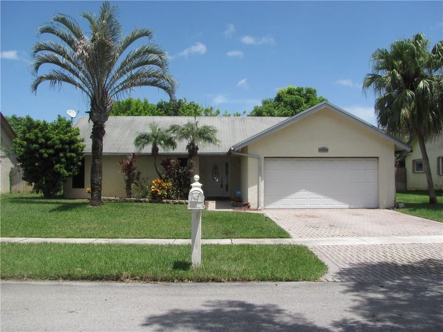 Move-in ready! Beautiful waterfront property. Property features 3 bedrooms, 2 bathroom, 2 car garage, eat-in kitchen, paved drive way, wood floor in bedrooms, tiled living area, vaulted ceiling, hurricane shutters, huge backyard, lots of fruit trees, NO HOA. Property close to Shopping Malls. close to restaurants, Parks. Minutes away from major highways.