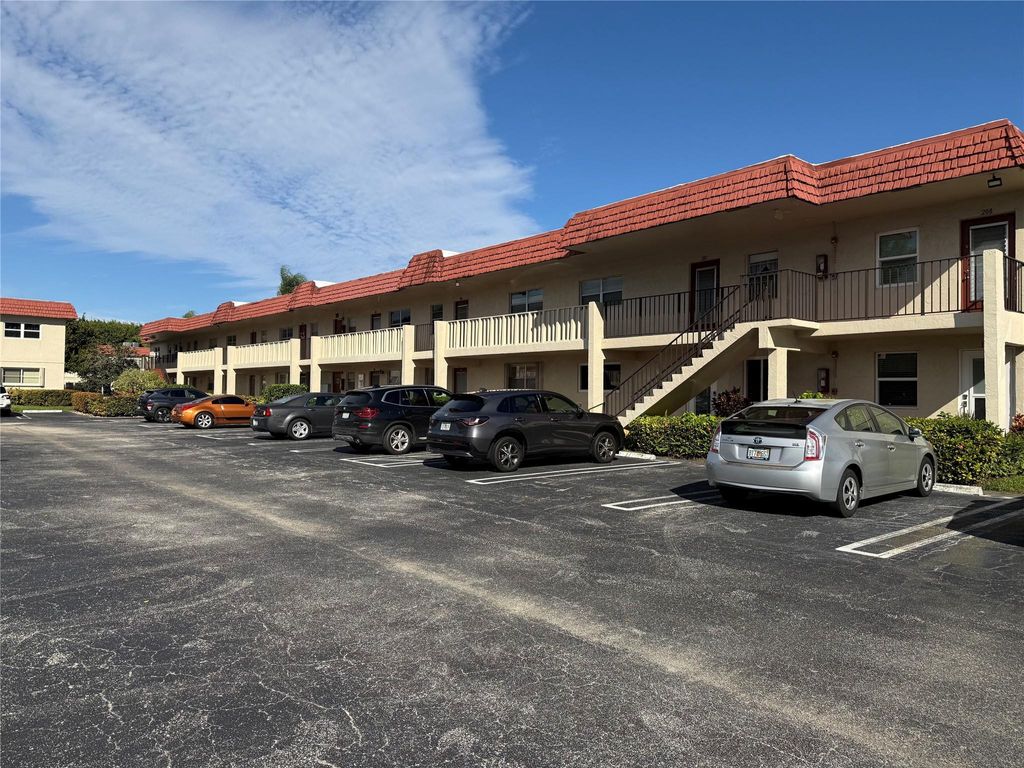 Photo of 22 Abbey Lane #205, Delray Beach, FL 33446 (MLS # F10542677)