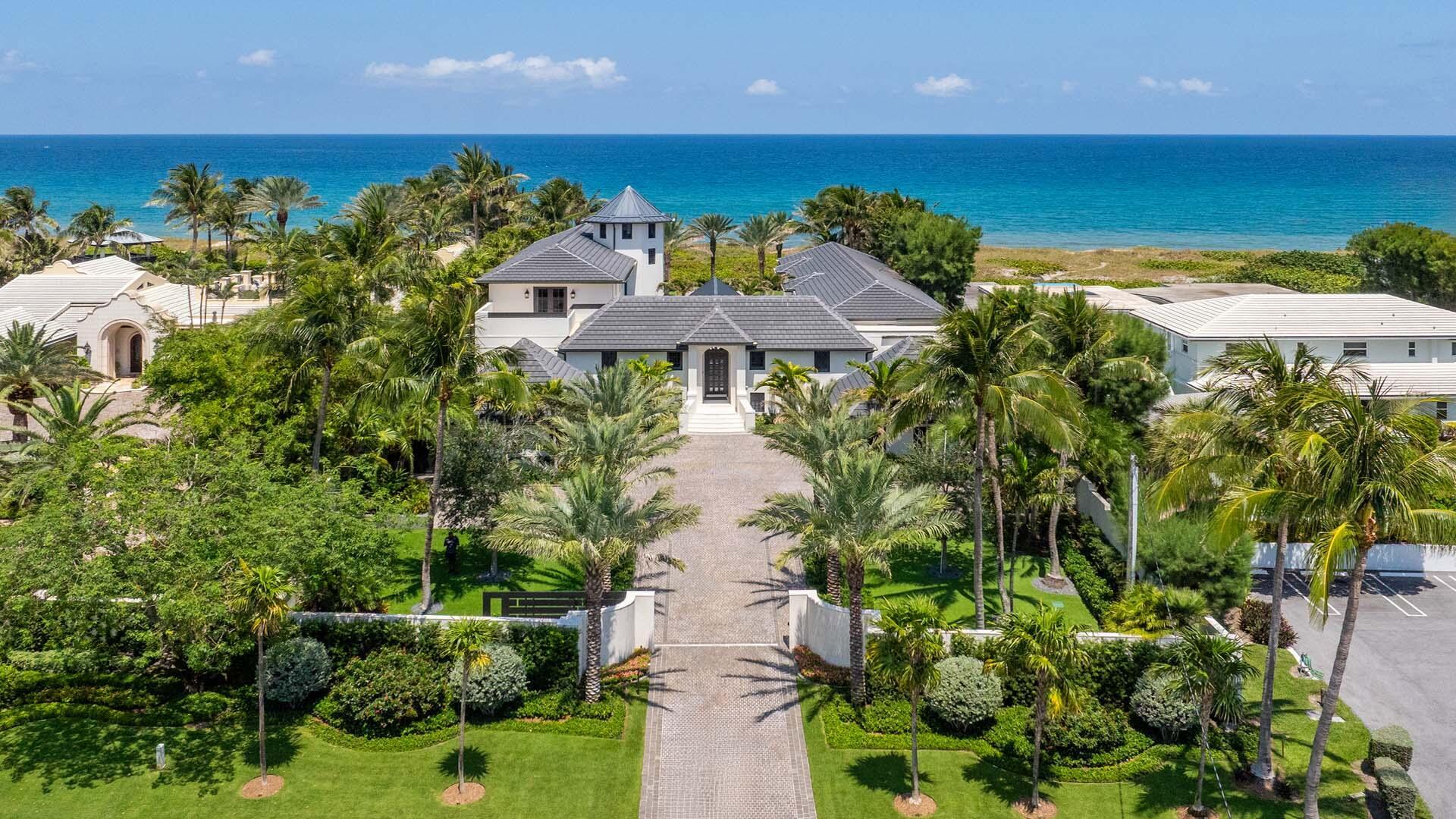 Completely renovated & turnkey oceanfront estate in Delray Beach Estate Section. Designed by Marc Michaels Interiors & renovated by Mouw Associates, this furnished residence sits on an ultra-deep 400'+ lot with unobstructed ocean views. Smart home features, high ceilings, custom lighting, plaster & wall coverings throughout. Chef's kitchen Wolf & Sub-Zero appliances, two islands plus full prep kitchen. Main-level club room, elevator, & designer powder room. Ground-floor primary suite with ocean views, dual baths, fireplace, & large closet. VIP upstairs suite with terrace, fireplace, & wet bar. 7 bedrooms including guest/staff quarters. Resort-style pool, spa, loggia, summer kitchen prep, cabana bath & private beach path. Four-car garage, full smart system, & lush landscape lighting.