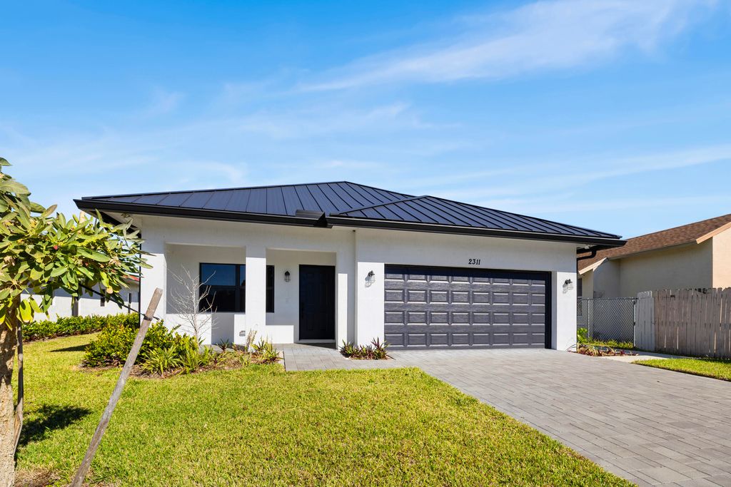 Photo of 2311 Zeder Avenue, Delray Beach, FL 33444 (MLS # R11167833)