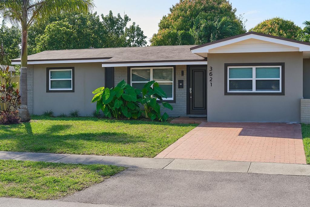 Photo of 3621 NW 35th Way, Lauderdale Lakes, FL 33309 (MLS # F10550617)