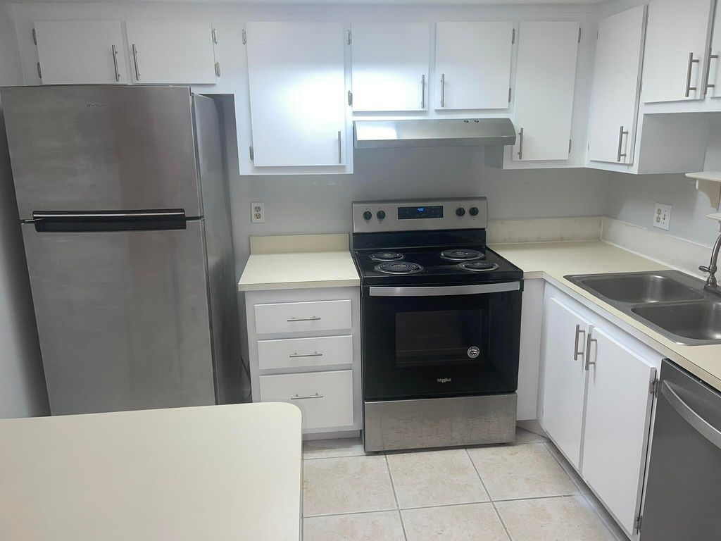 Photo of 4185 Oak Terrace Drive, Greenacres, FL 33463 (MLS # B26007990)