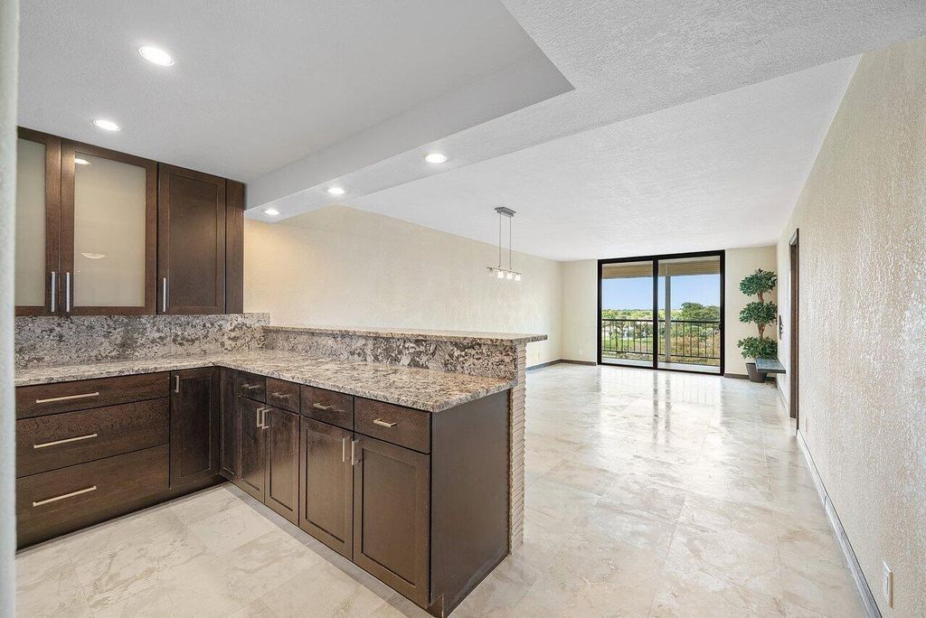 Photo of 2400 Deer Creek Country Club Boulevard #609-1, Deerfield Beach, FL 33442 (MLS # B26001932)