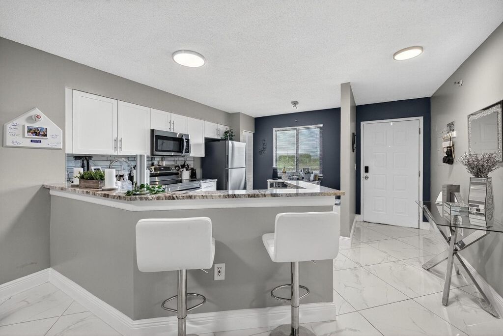 Photo of 2334 SW Cypress Bend Drive #511, Pompano Beach, FL 33069 (MLS # F10534794)