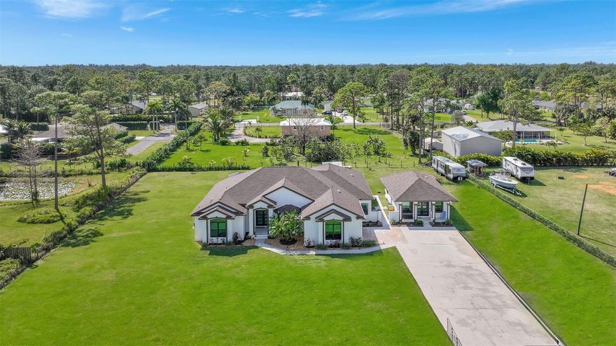 Exquisite Luxury Home with a Private Guest House- Epitome of Elegance and Comfort.  Situated on a freshly landscaped 1.15-acre lot with ample RV/boat parking, the updated main house 4BR/2.5BA home features fresh exterior/interior paint, new light fixtures, luxury vinyl flooring, an oversized primary suite, a spacious living room, and an open concept chef’s kitchen. Entertain outdoors with a fully screened-in pool/lanai. Host guests in the separate 1BR/1BA guest home with a full kitchen, W/D, and living room. Other considerations include new roofs (2024), 2-car garage w/storage, underground AT&T fiber optic lines, tankless water heaters, brand-new alarm systems, newer water softener system, impact windows/doors  and A/Cs, NO HOA and MUCH MORE!  Easy to show. Both Houses:Softener system 2022,New Well with improved linesRoof 2024Impact windows/doors 2022,Exterior painted 2023,Freshened landscapingBrand new sprinkler system (pump and timer)New pool timer and pool light New patio screens,Calusia bushes planted for privacy in front/back,New Honeywell Fence in the front/back,Brand new blinds through out with black out shades in bedroom,Outlets replaced including outlet cover, brand new switches,  New generator hookup New door handles throughout house,Extra storage in garage (hanging storage),New garage door motor + springs/lift for door,Brand new alarm systems in both main and guest house, smoke detectorsNew garbage disposalsGutters added 2023New base boards throughoutNew outside coach lightsMain House:A/C’s replaced 2020 and 2022 w/ new smart home thermostats by Sensi Touch SmartBrand new LED bulbs throughout recess lightingTankless water heaterNew reverse osmosis under kitchen sink 2022Luxury vinyl floors throughoutNew hardware in kitchen, new faucet, slow close cabinetsInterior paintedNew washer/dryer New Stove and dishwasher 3 new toiletsVanity replaced ½ bath, new mirror, light fixtureGuest BathBrand new tub, new tile, new cabinet hardware, painted vanity, new faucet, new light fixtureNew fans in every roomNew light fixtures in kitchen, dining room, front entry wayMaster bath, new hardware, new light fixtures, painted cabinet, all new tile throughout shower with brand new shower doorsNew light fixture in master bedroom, new handle on closet doorsGuest House:New ACTankless water heater 2022Dishwasher 2022Fridge 2022New tile throughoutEntire kitchen brand new cabinets, hardware, sinkFans replaced throughoutBrand new bathroom vanity, faucet, light fixtureWalk in shower, brand new tileNew toilet and washer/dryer hook up with stackable washer/dryer 2022 . Other improvements: Under ground FPL Lines in 2023.  AT&T fiber optics line.  Bring your boats, bring your trailers, bring your RV’s. Maintenance performed every 6months on A/Cs, sprinkler heads, and monthly for softener system. Annual septic pumping