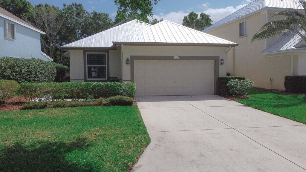 Photo of 3129 SW Solitaire Palm Drive, Palm City, FL 34990 (MLS # B26035647)