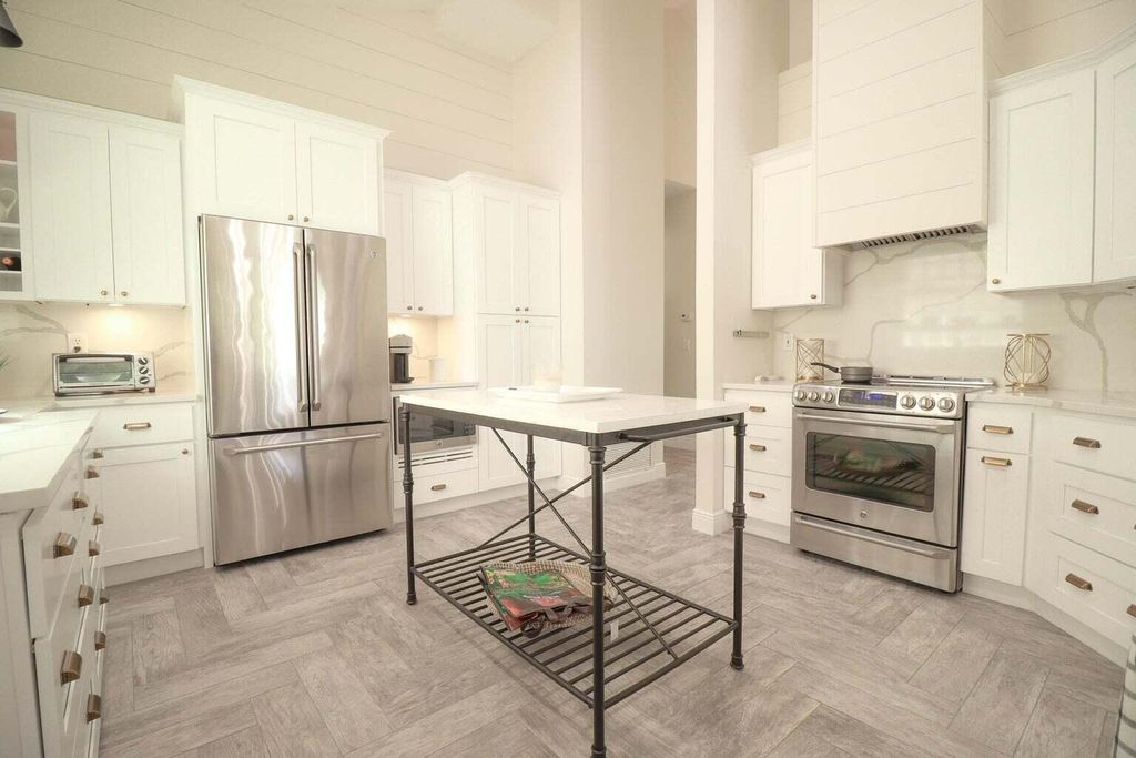 Photo of 3129 SW Solitaire Palm Drive, Palm City, FL 34990 (MLS # B26035647)
