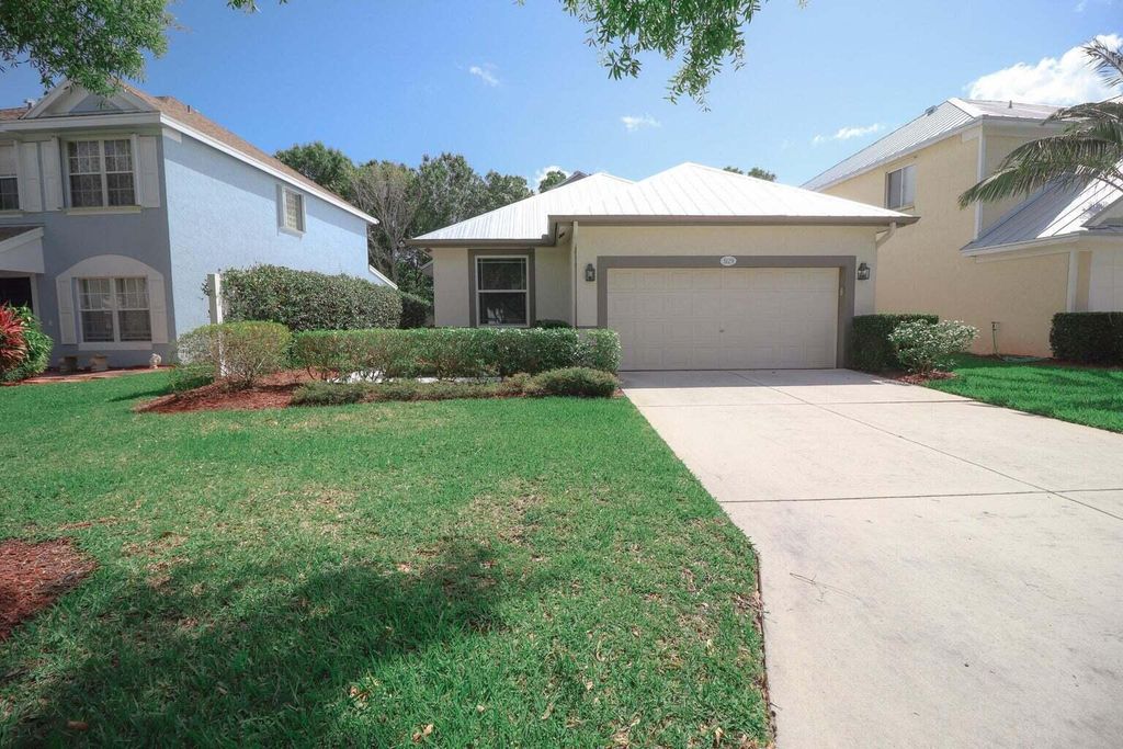 Photo of 3129 SW Solitaire Palm Drive, Palm City, FL 34990 (MLS # B26035647)