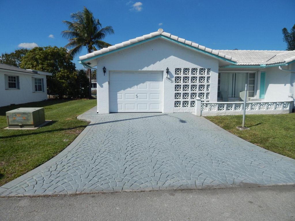 Photo of 6805 NW 77th Street, Tamarac, FL 33321 (MLS # B26006025)