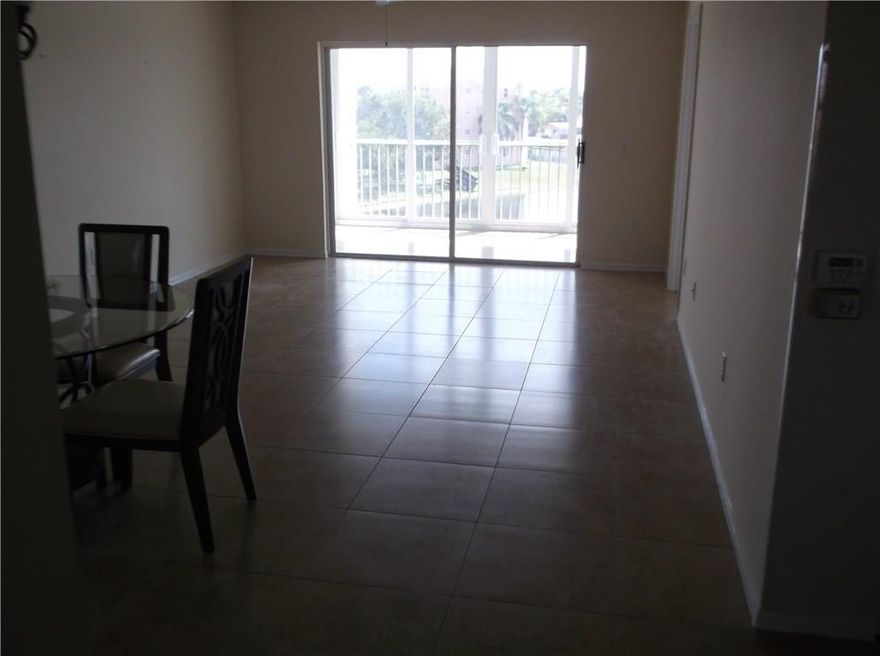 BRAND NEW IMPACT SLIDERS ON SCREENED BALCONY, ON A WIDE LAKE, BEDROOM WINDOWS ARE ALSO IMPACT, VERY LARGE CREAM TILE THRU OUT NEWER AC/H.W.H., NEWER KITCHEN WITH WHITE CABINETS AND TOP LINE APPLIANCES, APT LOOKS LIKE A MODEL, BRING YOUR FUSSIEST BUYERS.  ASSOC. SAYS 55+ COMMUNITY MUST HAVE $35,000 NET YEARLY INCOME AND GOOD CREDIT. SELLERS REQUEST PROOF OF INCOME AND CREDIT REPORT/SUMMARY PAGE/SCORE, 10% DEP. AS/IS WITH 5/DAY INSPEC. PROOF OF FUNDS TO CLOSE, WITH ALL OFFERS. THANKS THIS UNIT IS NOW VACANT