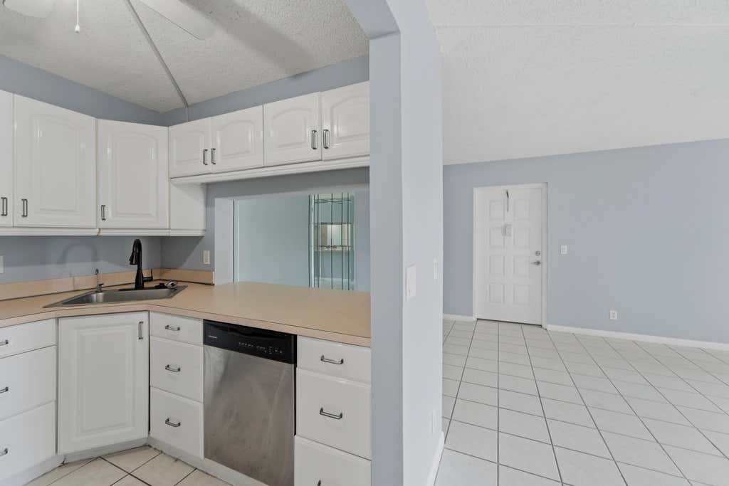 Photo of 728 Sunny Pine Way #A1, Greenacres, FL 33415 (MLS # B26066318)