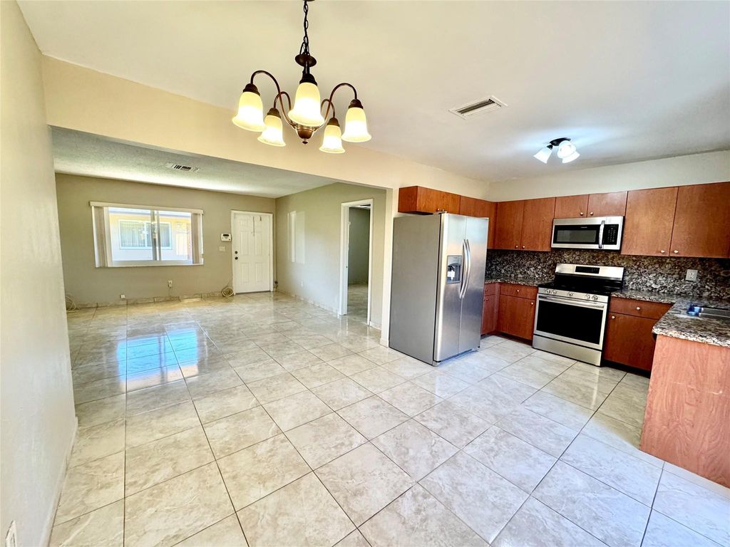 Photo of 6133 Buchanan Street, Hollywood, FL 33024 (MLS # B26029884)