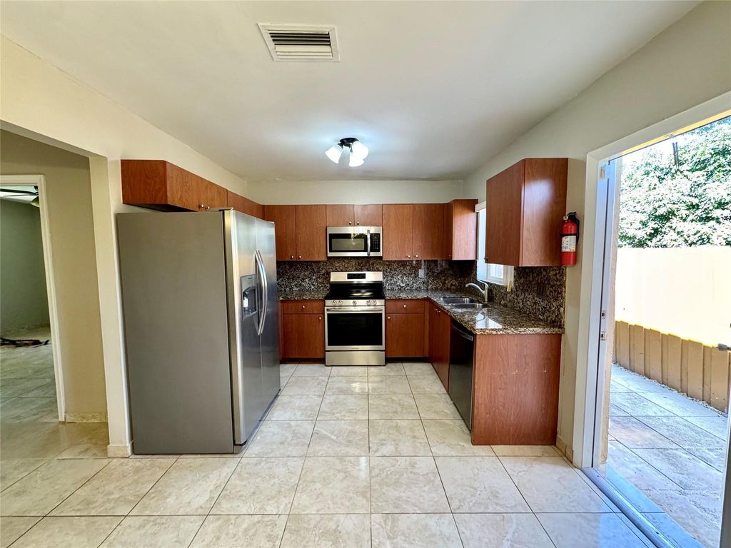 Photo of 6133 Buchanan Street, Hollywood, FL 33024 (MLS # B26029884)
