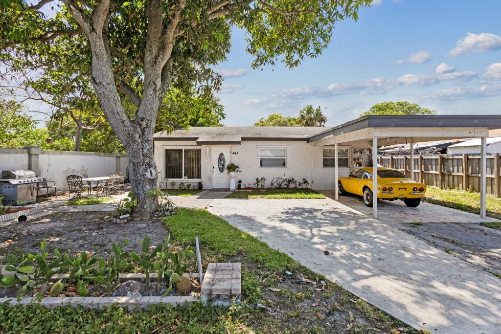 Photo of 441 NW 1st Way, Deerfield Beach, FL 33441 (MLS # R10985062)
