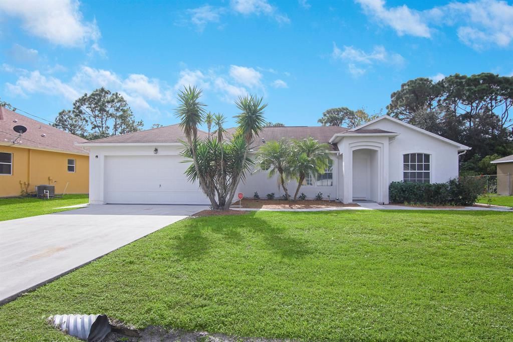 Photo of 5950 NW Culebra Avenue, Port Saint Lucie, FL 34953 (MLS # R10768464)