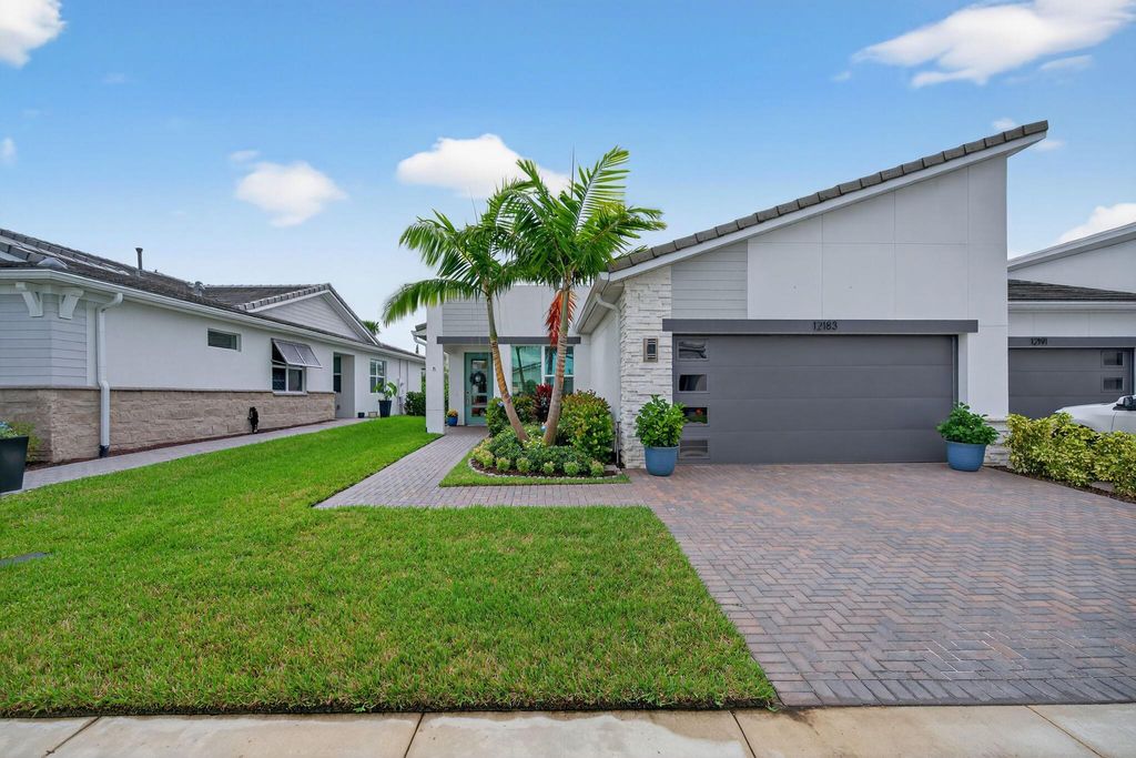 Photo of 12183 SW Viridian Boulevard, Port Saint Lucie, FL 34987 (MLS # R11130243)
