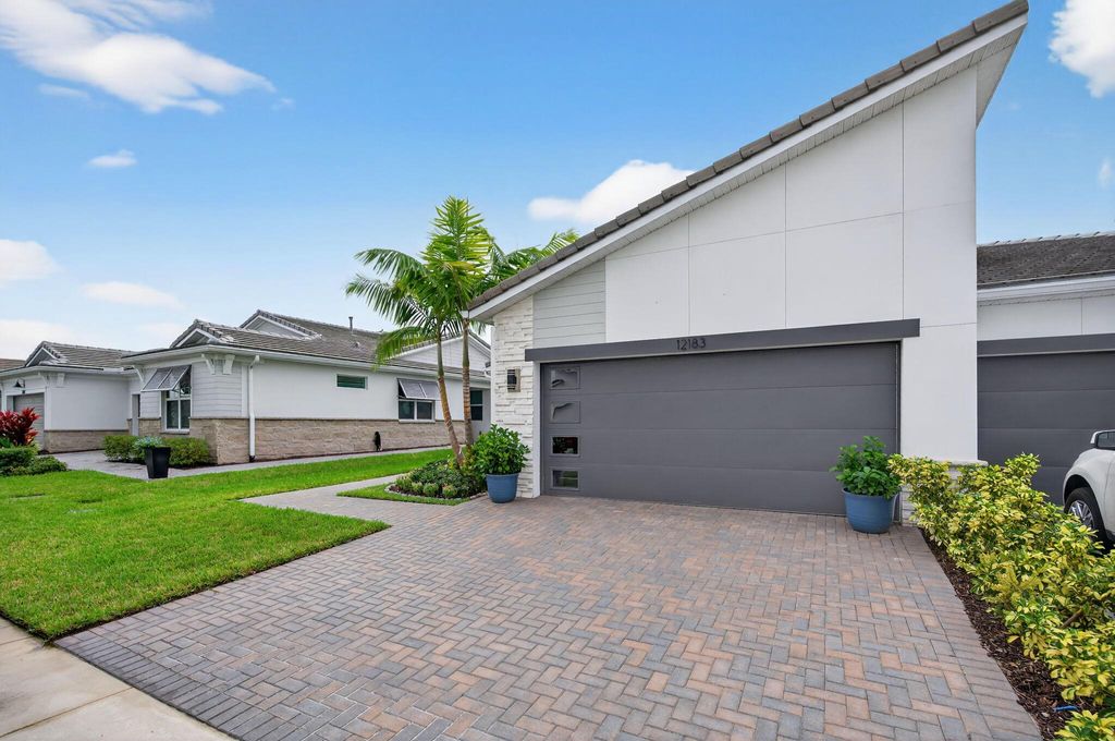 Photo of 12183 SW Viridian Boulevard, Port Saint Lucie, FL 34987 (MLS # R11130243)