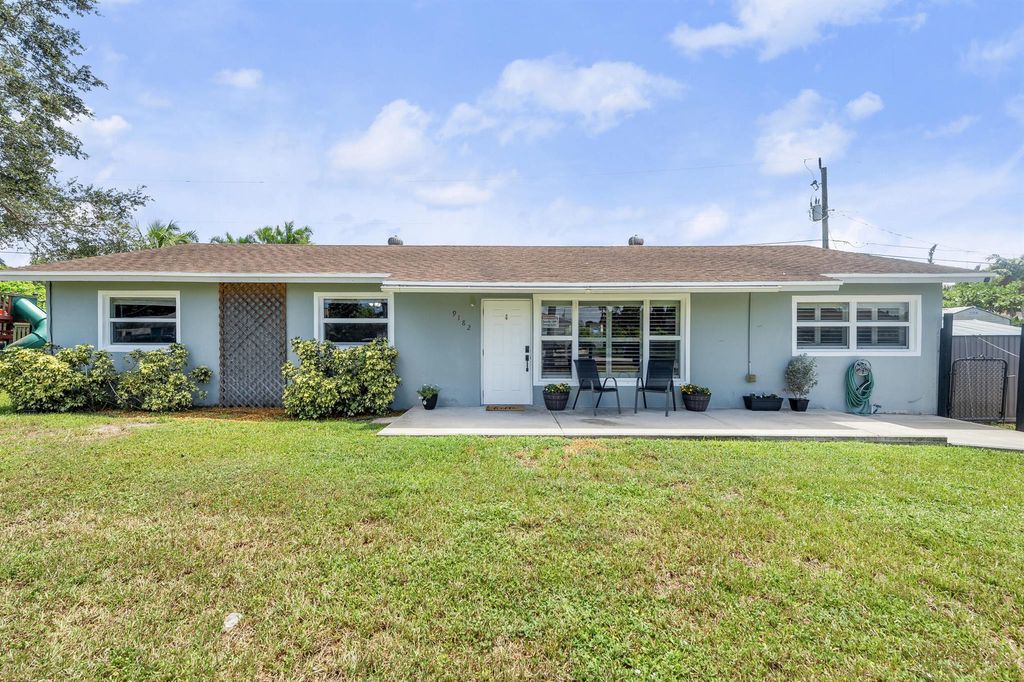 Photo of 9182 Lantern Drive, Lake Worth, FL 33467 (MLS # R11117290)