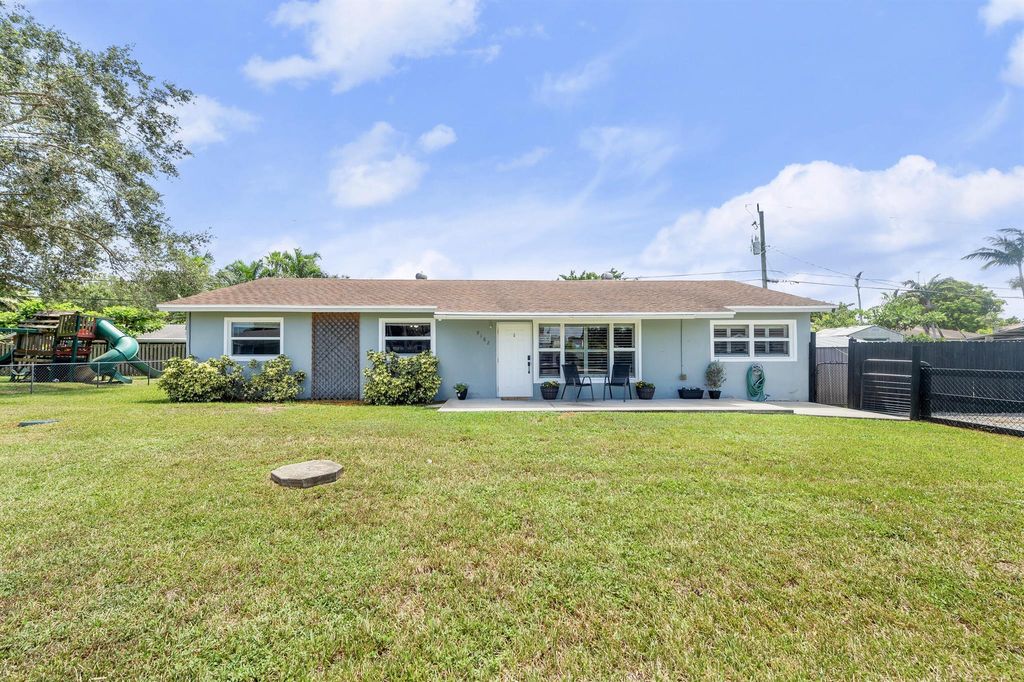 Photo of 9182 Lantern Drive, Lake Worth, FL 33467 (MLS # R11117290)