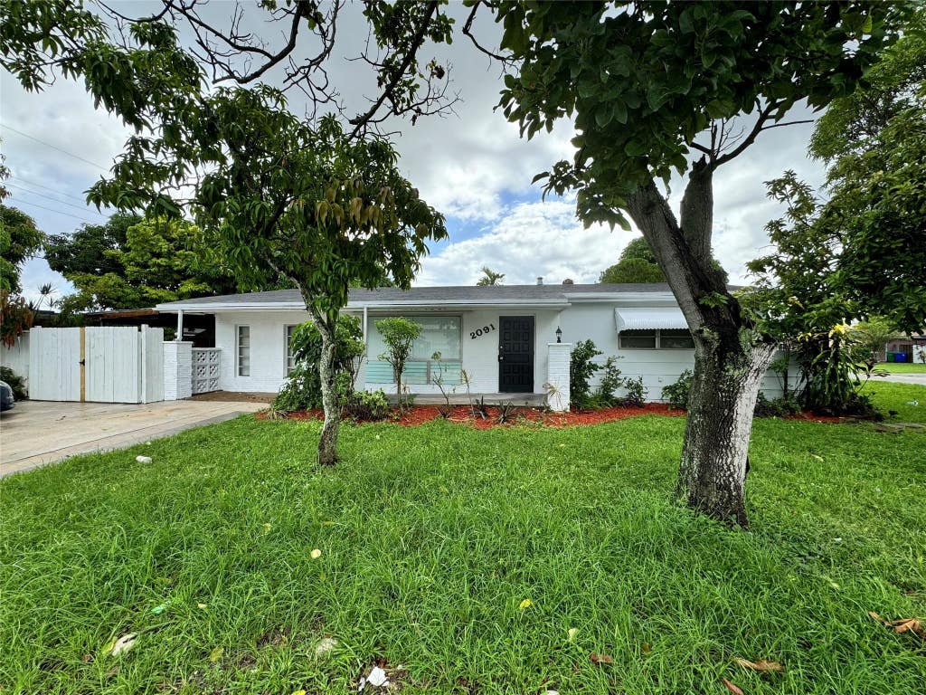 Photo of 2091 Oleander Drive, Miramar, FL 33023 (MLS # B26039396)