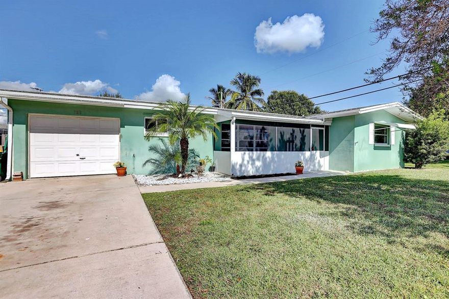 Perfect opportunity for someone looking to put their own personal touch. Looking for that old Florida Charm? Welcome to this 2 bedroom 2 bath CBS constructed home. As you walk through the front door you will notice a white brick feature wall and terrazzo floors in the living room. Perfect starter home. This home could easily be converted to a 3 bedroom. Close to shopping, dining, hospitals.