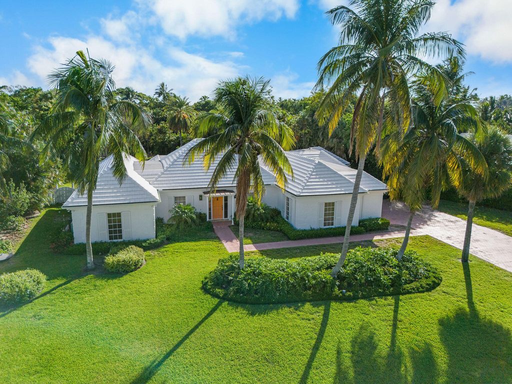 Photo of 12058 Turtle Beach Road, North Palm Beach, FL 33408 (MLS # R11104987)