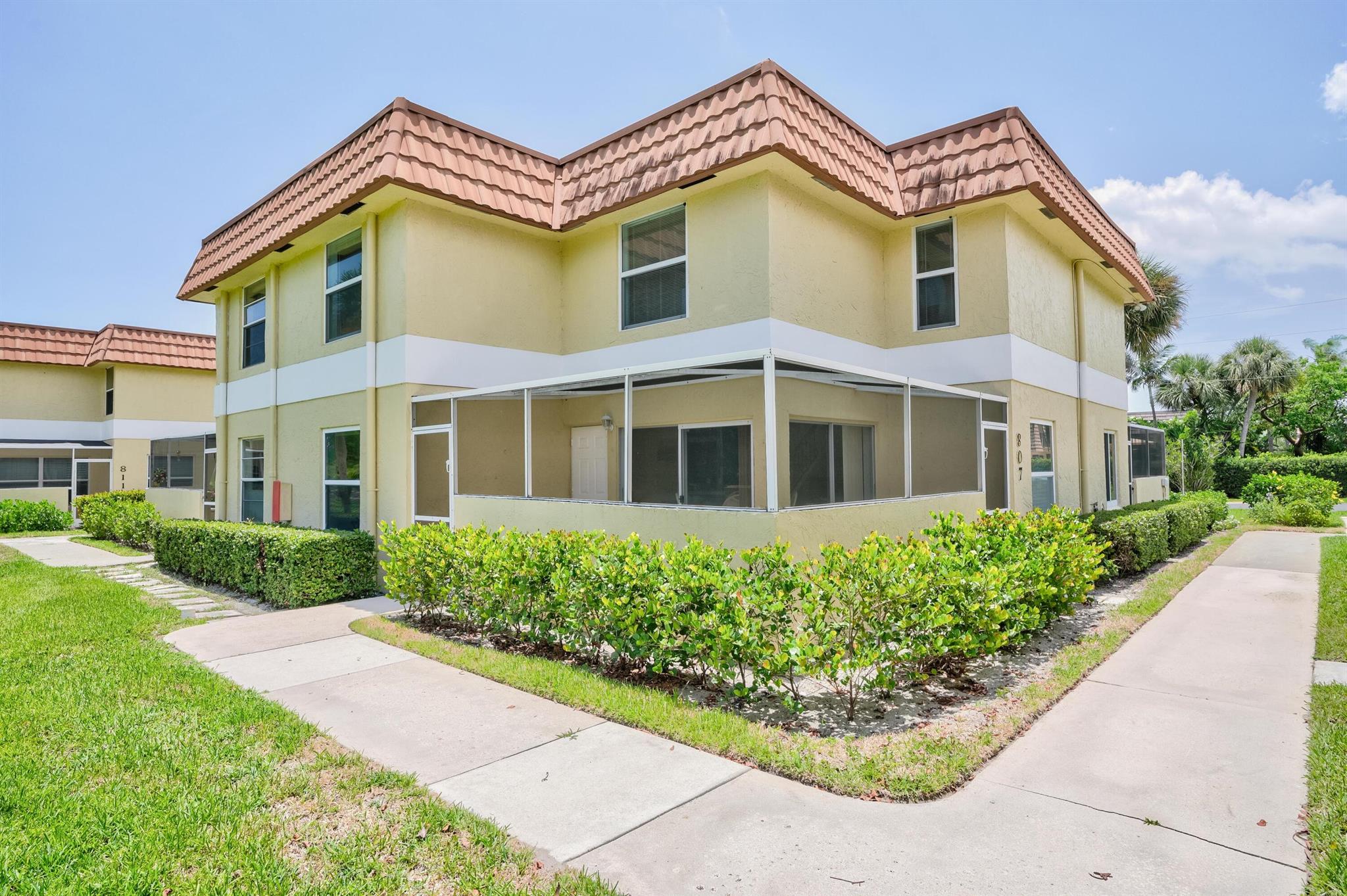 Fantastic location with walkable access to Carlin Park and the Atlantic Ocean beaches! 2 bedrooms, 2.5 bath townhouse styled design. Open floorplan, updated kitchen & baths. Full sized washer & dryer. New central A/C 2022! L-shaped screened patio. One assigned parking space. Community features heated pool, tennis and pickleball courts and shuffleboard. 90 day minimum rental period. Not an age restricted community...bring the kids, but no pets or trucks allowed. Zoned for great public schools! Jupiter's famous Riverwalk along the Intracoastal begins directly across the street and allows easy access to Harborside shops and restaurants. Carlin Park has 1.5 mile heart exercise trail. Enjoy having your toes in the sand, sunshine and swaying Palm trees! Available annual, seasonal or off-season.