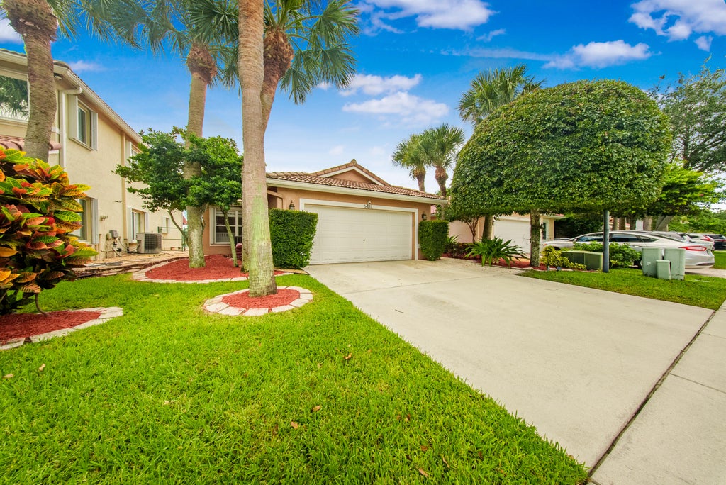 Photo of 6481 Willoughby Circle, Lake Worth, FL 33463 (MLS # B26079784)